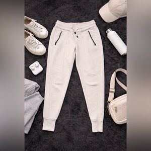 Stylish Cream Joggers with Black Zipper Accents